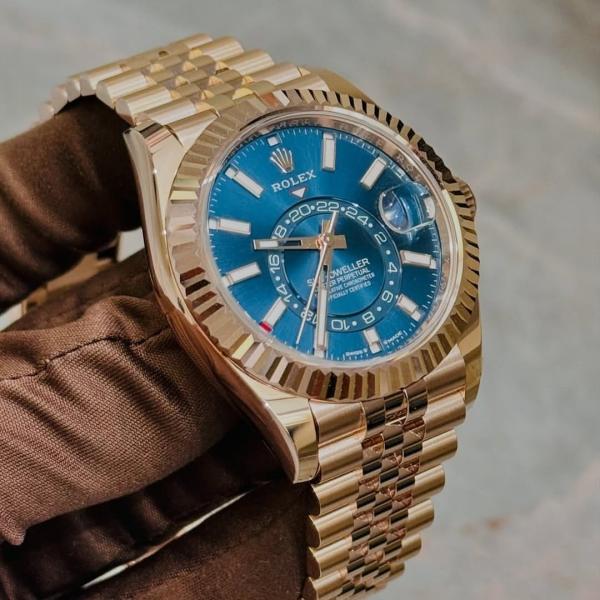 Rolex Sky Dweller gold chain