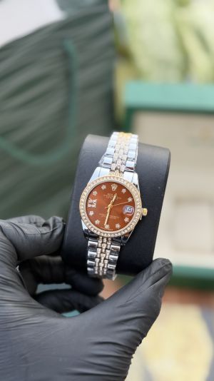 Rolex diamond two tone orange dial