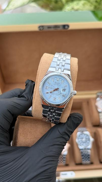 Rolex land dweller silver with aqua dial