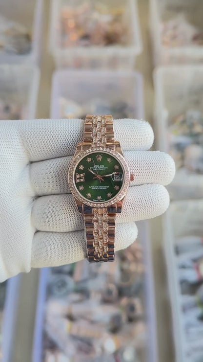 Rolex diamond rose gold with green dial