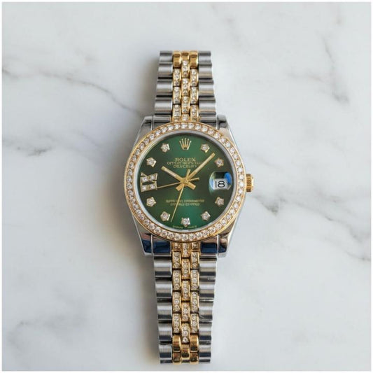 Rolex diamond two tone with green dial
