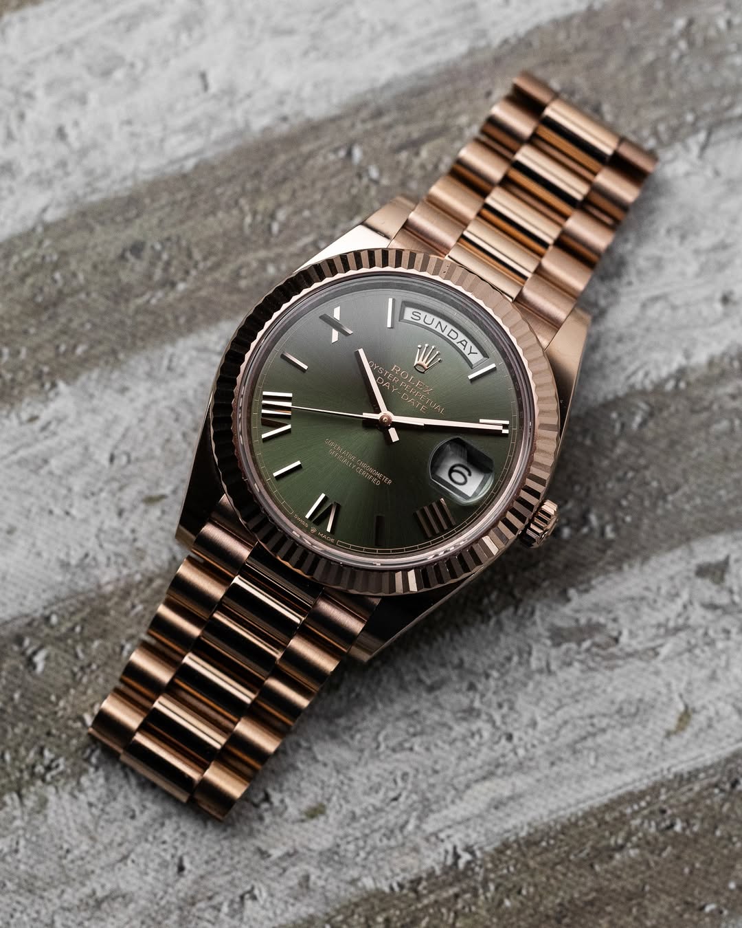 Rolex rose gold green dial