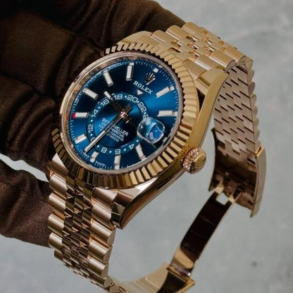 Rolex Sky Dweller gold chain