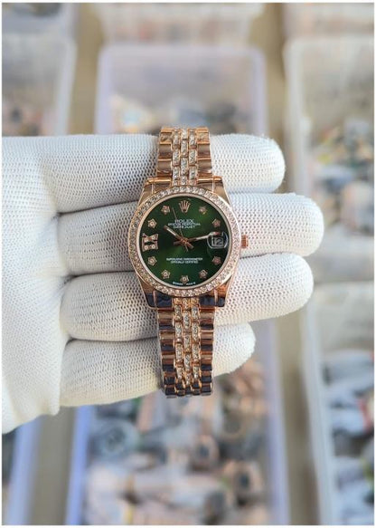 Rolex diamond rose gold with green dial