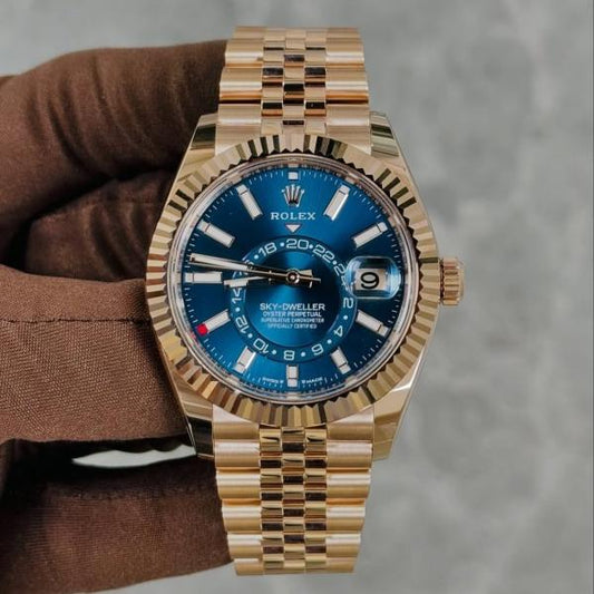 Rolex Sky Dweller gold chain