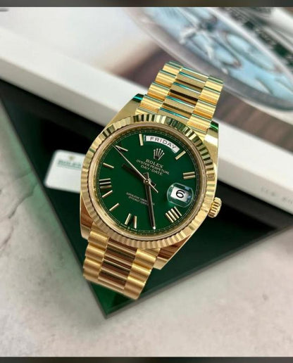 Rolex gold green dial