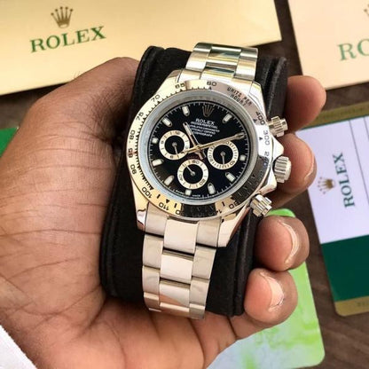 Rolex Daytona silver chain black dial